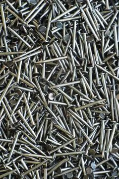 Metal nails macro flat lay background Stock Photos