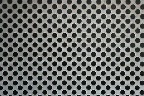 Metal net circle texture background networks with holes Stock Photos