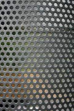 Metal net circle texture background networks with holes Stock Photos
