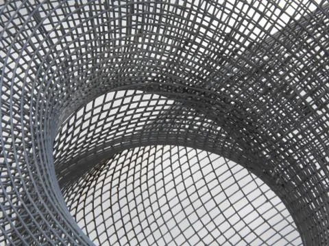 Metal net twisted in different ways Stock Photos