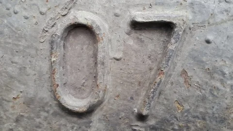 Metal number 7. Texture of rusty metal in the form of figures 7 Stock Footage
