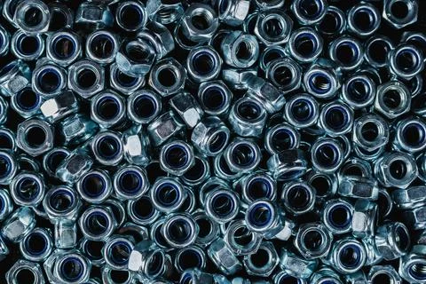 Metal nut with control ring against unscrewing Stock Photos