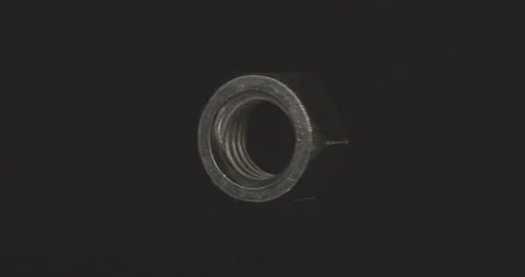 Metal nut spinning in the void Video stock 149935177