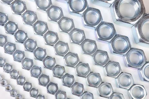 Metal nuts of different sizes Stock Photos