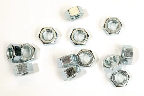 Metal nuts on a white background. close-up Foto stock