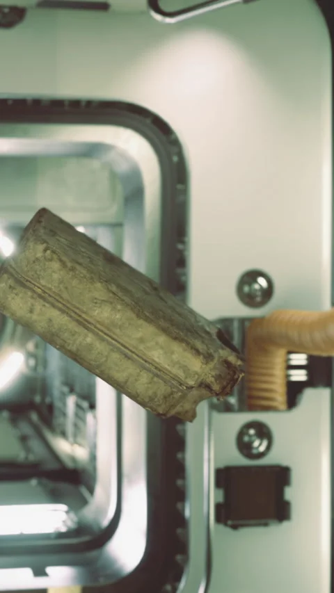 Metal object floats inside a futuristic space station in low gravity Stock Footage 334263779