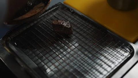 A metal pan with a mesh on top of it Stock Footage 295994277