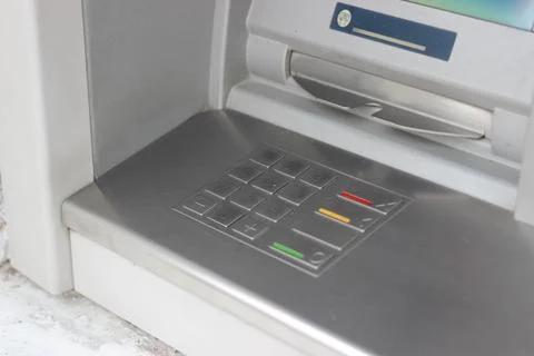 Metal panel of ATM with keyboard for code pin entry with inscriptions in Engl Stock Photos