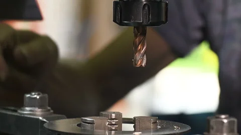 Metal part drill process work lathe engineer hands Stock Footage 136418037