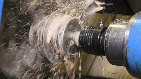Metal part drill process work lathe cooling liquid Stock Footage 136429473