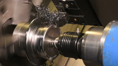 Metal part drill processing work lathe shavings Stock Footage 136429872