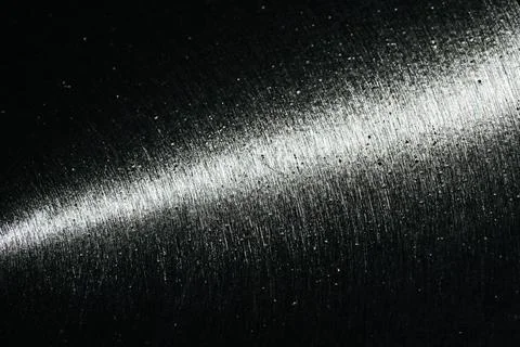 Metal part of a wheel scratched with disk brakes with thin line of light Stock Photos