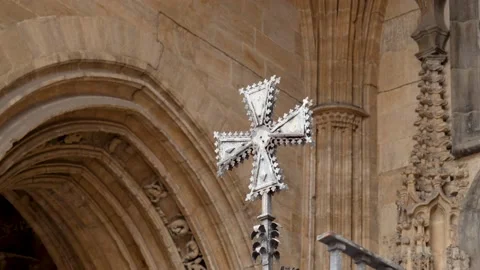 Metal patterned cross on the gate of the Cathedral of San Salvador 動画素材 201861309