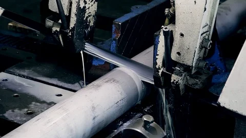 Metal pipe cutting using power saw blade Stock Footage 91074444