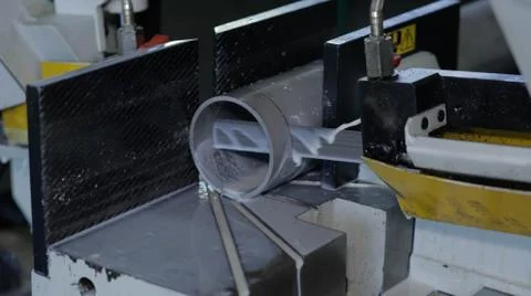 Metal pipe cutting using power saw blade Stock Photos