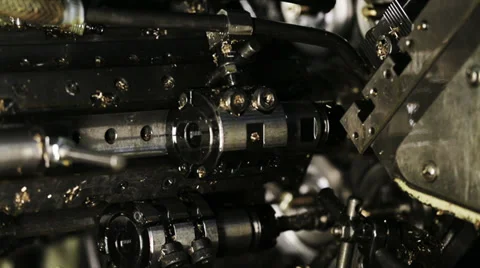 Metal pistons of automatic lathe Stock Footage 32326641