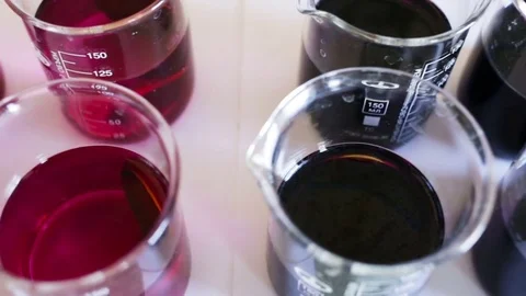 Metal plate of circular shape lying in the potassium permanganate solution, the Stock Footage 85369020