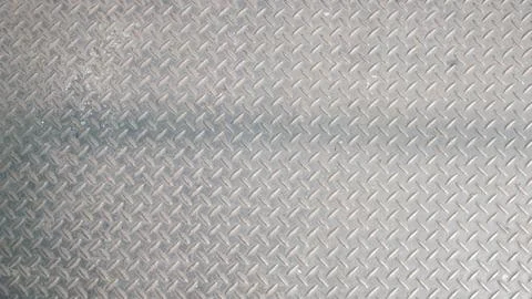 A metal plate texture with diamond pattern Foto stock