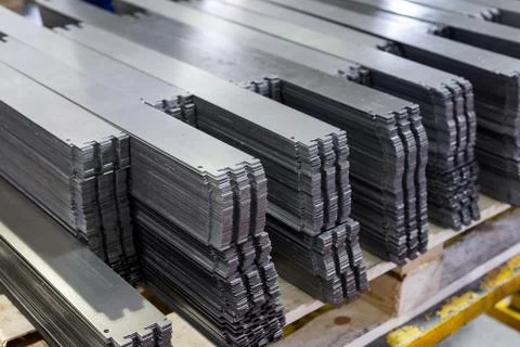 Metal plates after processing on die-cutting press Stock Photos