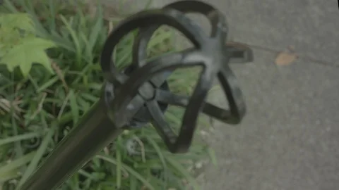 Metal Pole In Ground Flip Video stock 124977442