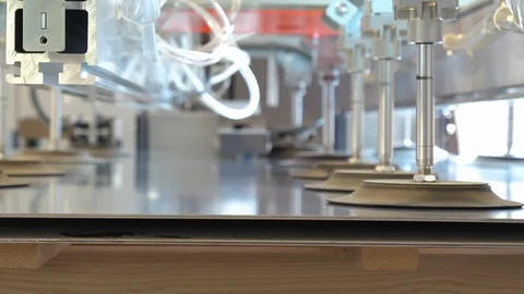 Metal processing industry, suckers take metal sheet for processing Stock Footage 93131717