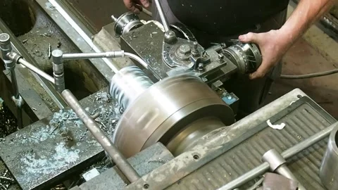 Metal processing on a lathe Stock Footage 99789605