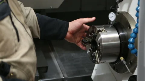 Metal processing machine with hydraulic system and hands worker closeup Stock Footage 57464802