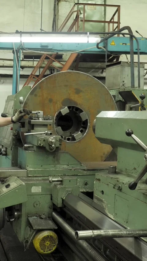 Metal processing on a machine tool with sparks flying from the tool being used Stock Footage 323955773