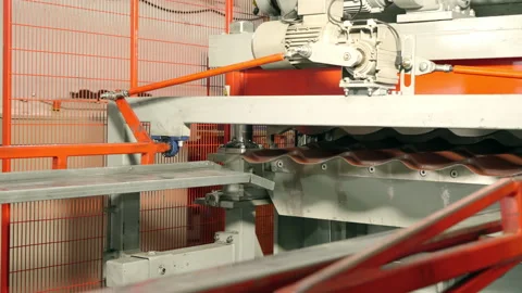 Metal processing. Trimming metal sheets. Metal tile production line at the Stock Footage 196932417