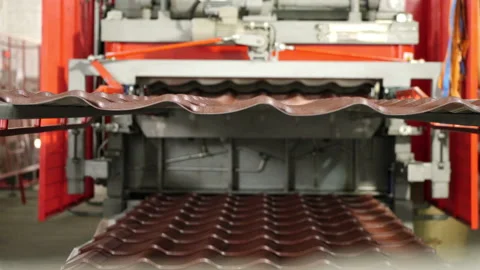 Metal processing. Trimming metal sheets. Metal tile production line at the Stock Footage 196932785