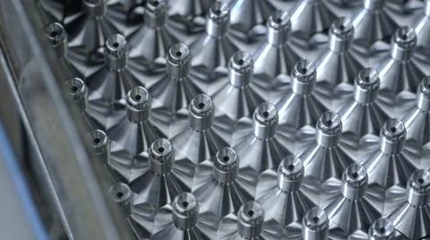 Metal products with screw thread on an assembly line Stock Footage 60443157