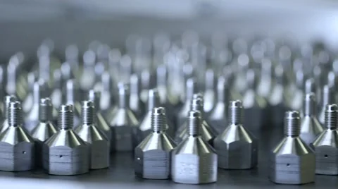 Metal products with screw thread moving on conveyor belt Stock Footage 60443136