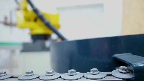 Metal products with screw thread moving on conveyor belt 스톡 동영상 83667602