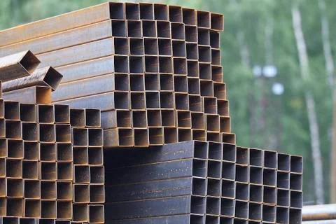 Metal profile pipe of rectangular cross section in packs at the warehouse of Stock-Fotos