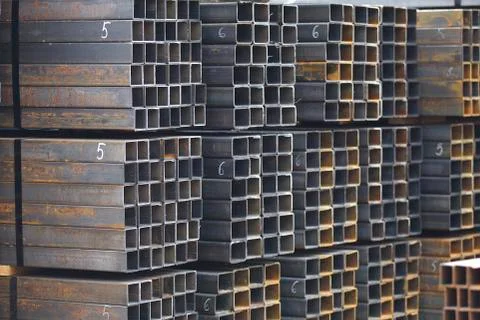 Metal profile pipe of rectangular cross section in packs at the warehouse of Stock-Fotos