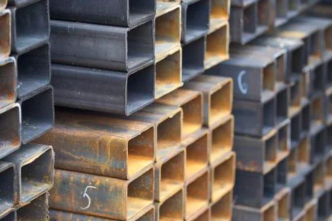 Metal profile pipe of rectangular cross section in packs at the warehouse of Stock-Fotos