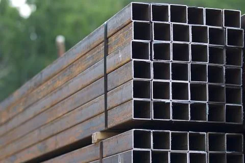 Metal profile pipe of rectangular cross section in packs at the warehouse of Stock-Fotos