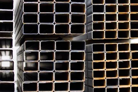 Metal profile pipe of rectangular cross section in packs at the warehouse of Stock-Fotos