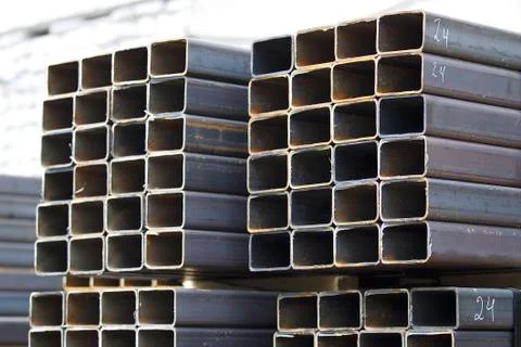 Metal profile pipe of rectangular cross section in packs at the warehouse of Stock-Fotos