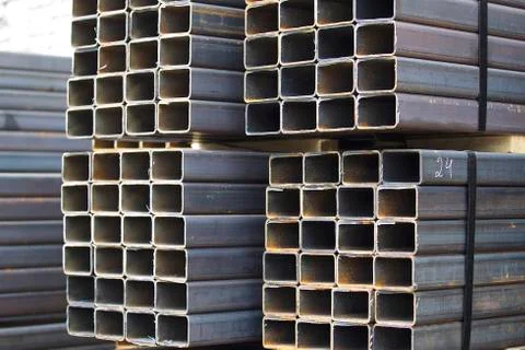 Metal profile pipe of rectangular cross section in packs at the warehouse of Stock-Fotos