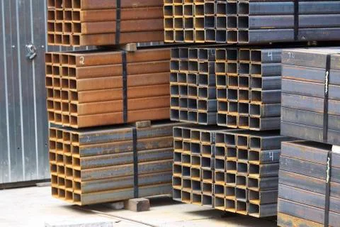 Metal profile pipe of rectangular cross section in packs at the warehouse of Stock-Fotos