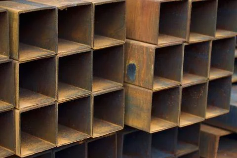 Metal profile pipe of rectangular cross section in packs at the warehouse of Stock-Fotos