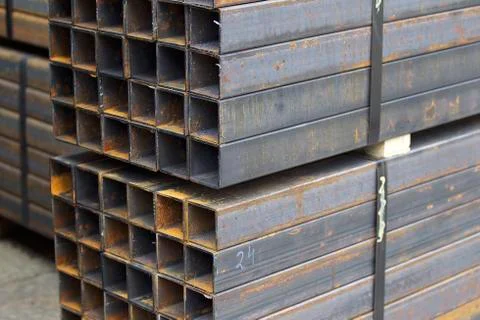 Metal profile pipe of rectangular cross section in packs at the warehouse of Stock-Fotos
