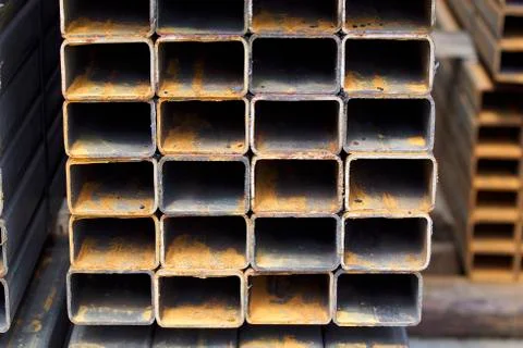 Metal profile pipe of rectangular cross section in packs at the warehouse of Stock-Fotos