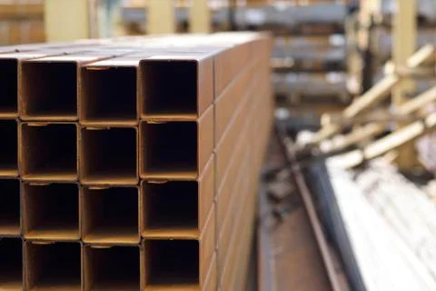 Metal profile pipe of rectangular cross section in packs at the warehouse of Stock-Fotos