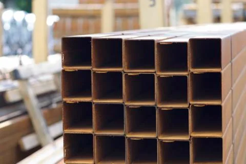 Metal profile pipe of rectangular cross section in packs at the warehouse of Stock-Fotos