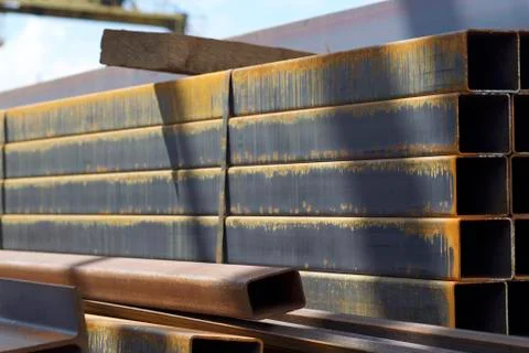 Metal profile pipe of rectangular cross section in packs at the warehouse of Stock-Fotos