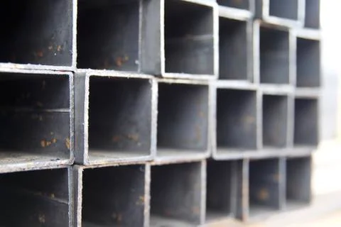 Metal profile pipe of rectangular cross section in packs at the warehouse of Stock-Fotos