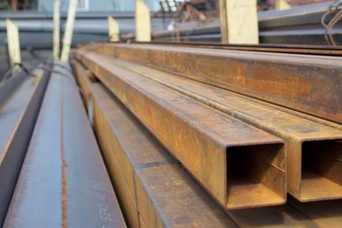 Metal profile pipe of rectangular cross section in packs at the warehouse of Photos