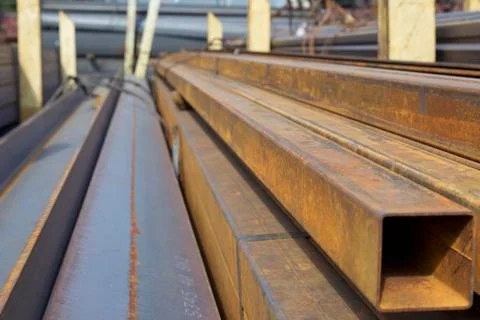 Metal profile pipe of rectangular cross section in packs at the warehouse of 스톡 사진